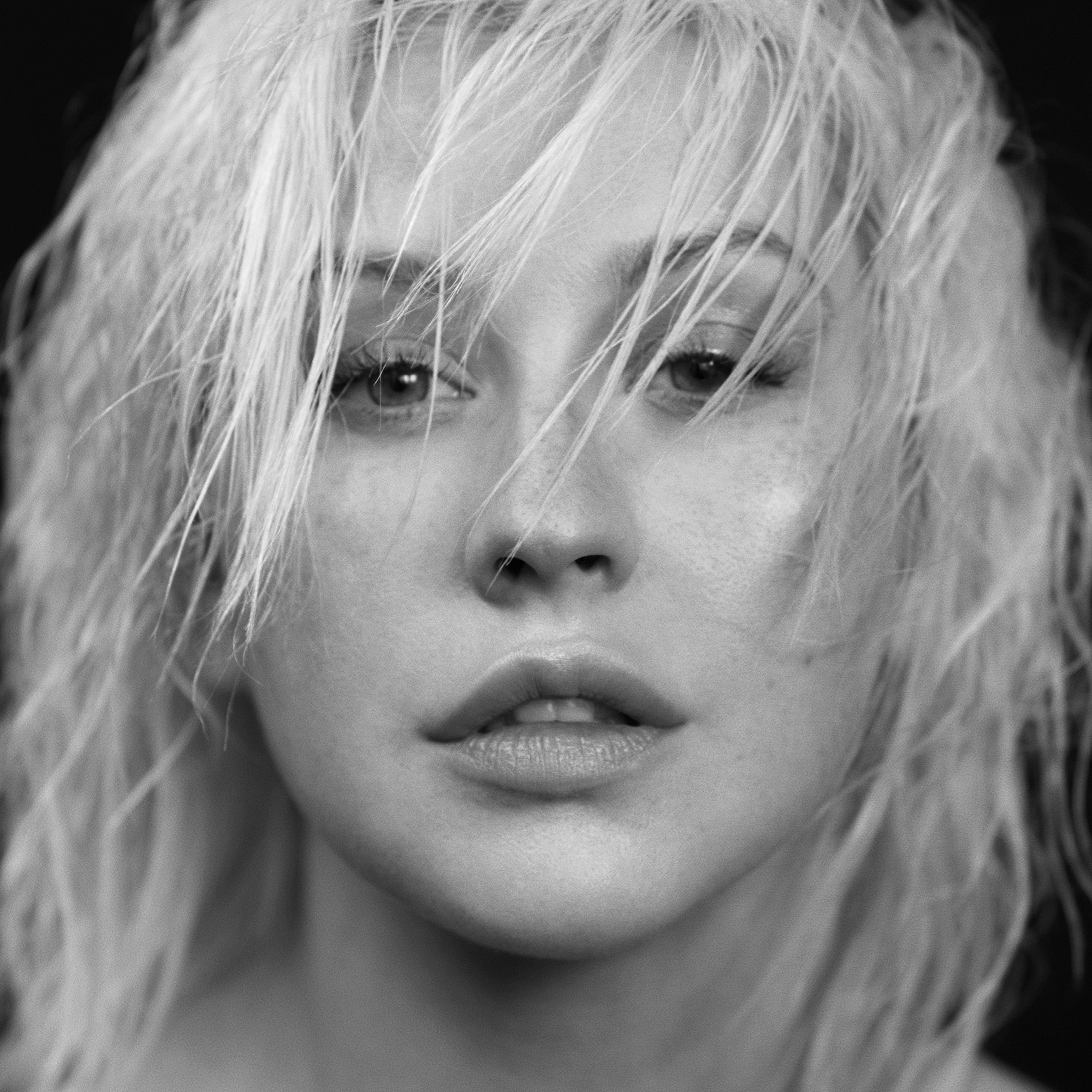Christina Aguilera's New Look: Is Photoshopping Ruining Her Image? Christina Aguilera's New Look: Is Photoshopping Ruining Her Image?