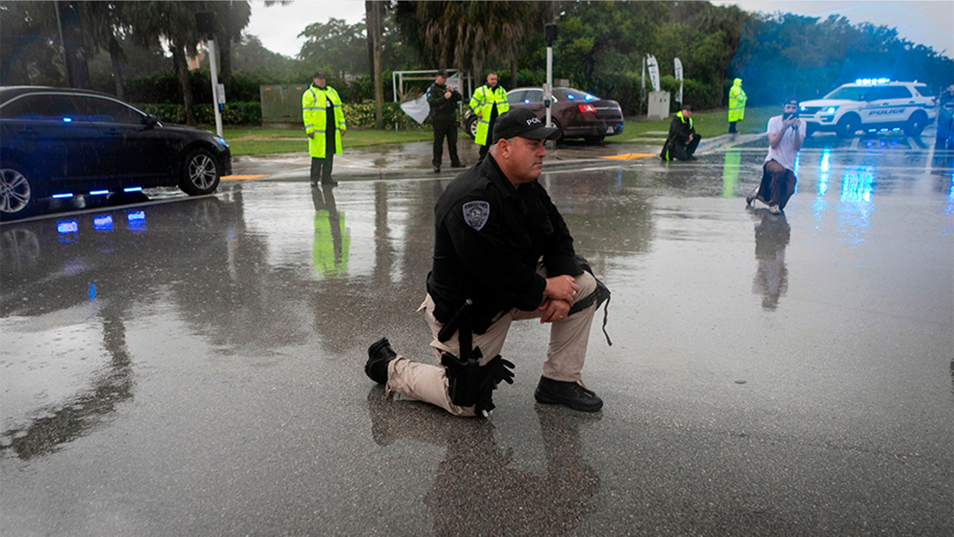 FBI Reassigns Agents From Iconic George Floyd Protest Kneeling Photo FBI Reassigns Agents From Iconic George Floyd Protest Kneeling Photo