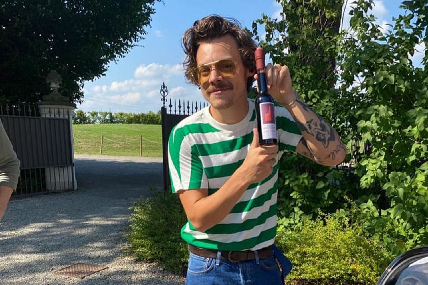 Harry Styles Debuts Retro Mustache During London Appearance Harry Styles Debuts Retro Mustache During London Appearance