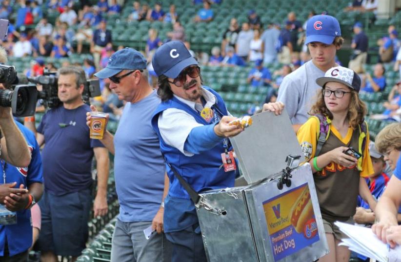 Lady And The Tramp: Cubs Fans Share A Hot Dog Kiss At Wrigley Field Lady And The Tramp: Cubs Fans Share A Hot Dog Kiss At Wrigley Field