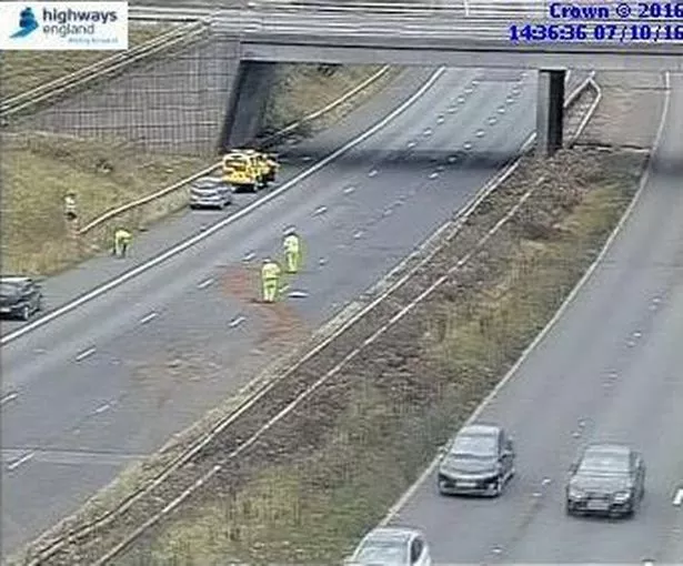 M56 Motorway Crash: Car Overturns, Paramedics Treat Casualty M56 Motorway Crash: Car Overturns, Paramedics Treat Casualty