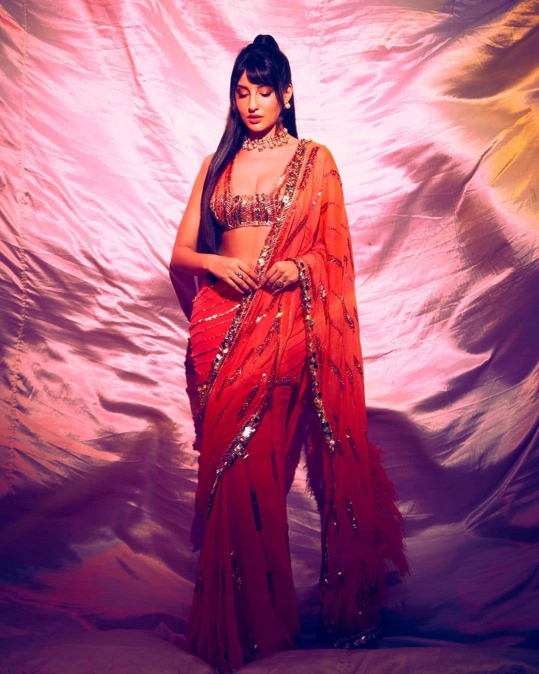 Nora Fatehi's Floral Saree: Ethnic Glam At Its Finest Nora Fatehi's Floral Saree: Ethnic Glam At Its Finest