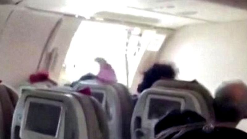 Passenger's Mid-Flight Door Attempt Causes Tokyo Flight Diversion To Seattle Passenger's Mid-Flight Door Attempt Causes Tokyo Flight Diversion To Seattle