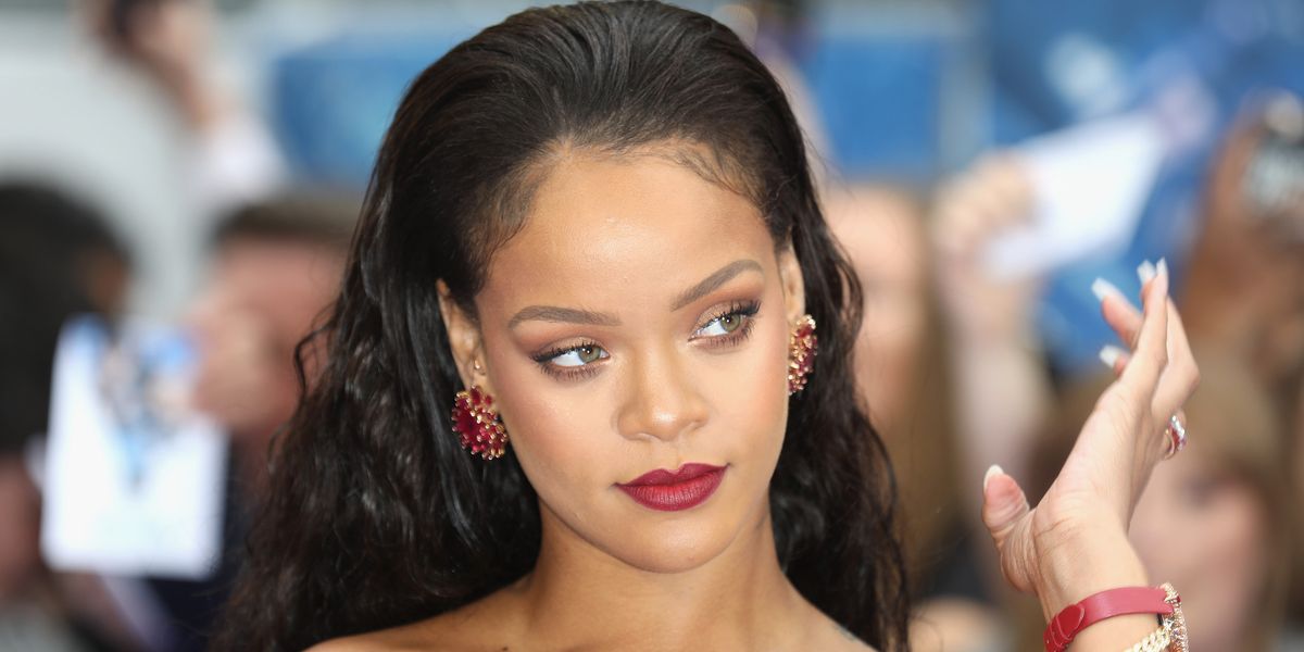Rihanna's Stunning Cherry Red Heels And Giant Engagement Ring Rihanna's Stunning Cherry Red Heels And Giant Engagement Ring